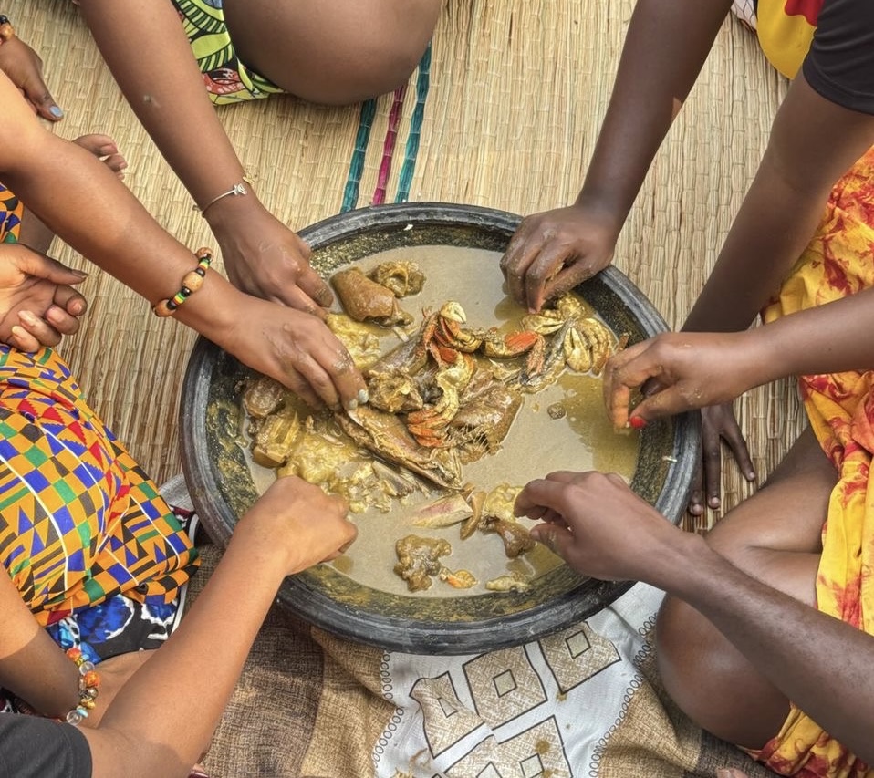 Ghanaians eating together